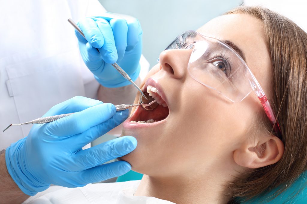 Overview of dentist working on a patient