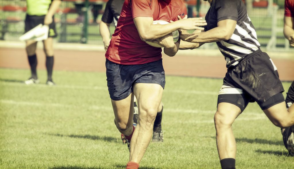 Men Playing Rugby