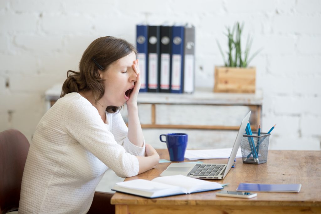 a woman yawning