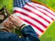 military veteran saluting the flag