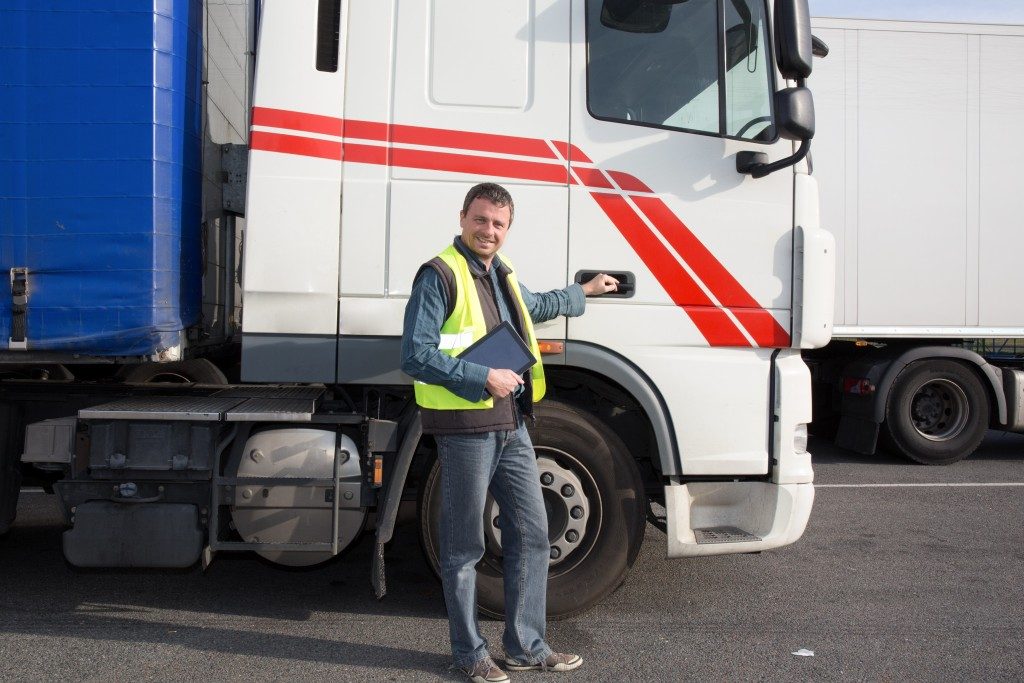 Driver Beside His Truck