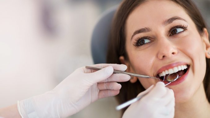 Woman Having Her Teeth Checked