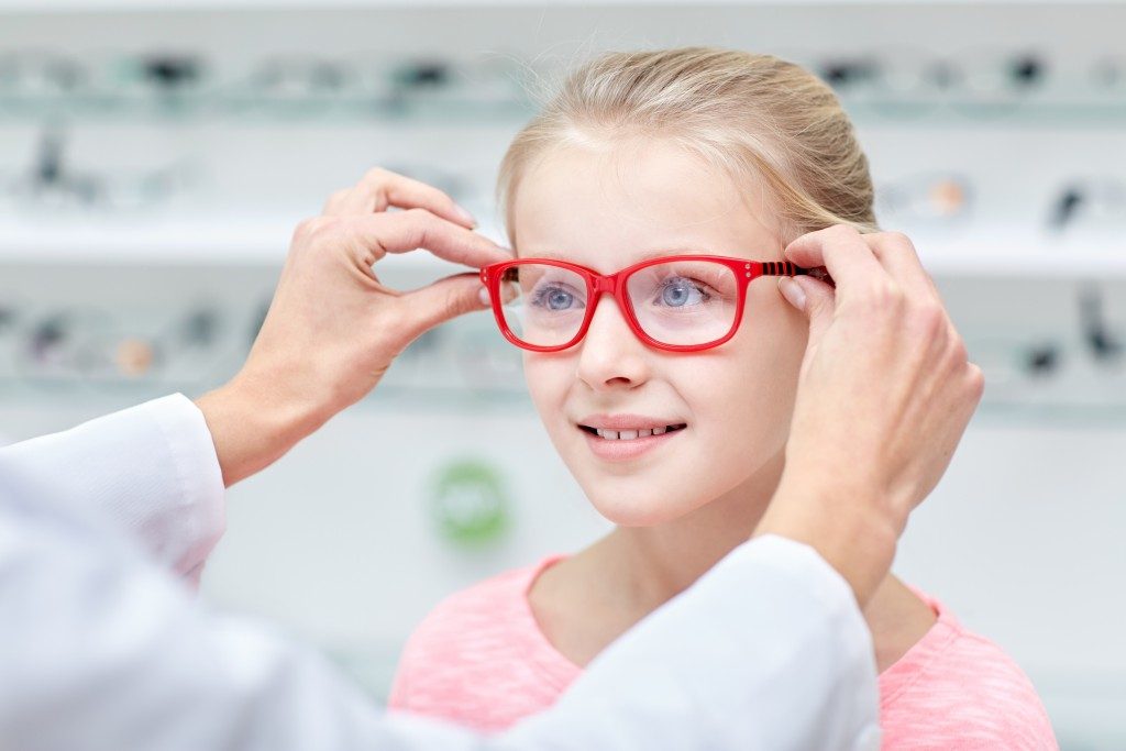 Child getting glasses