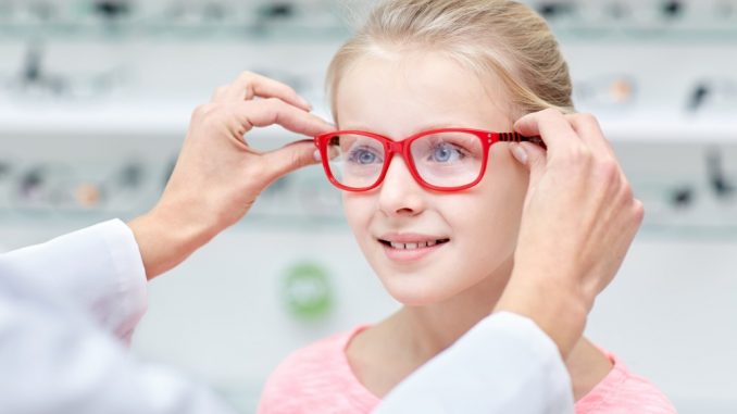 Child getting glasses