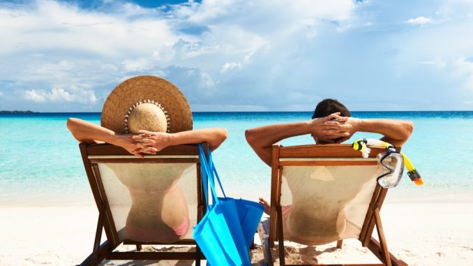 couple relaxing on a beach