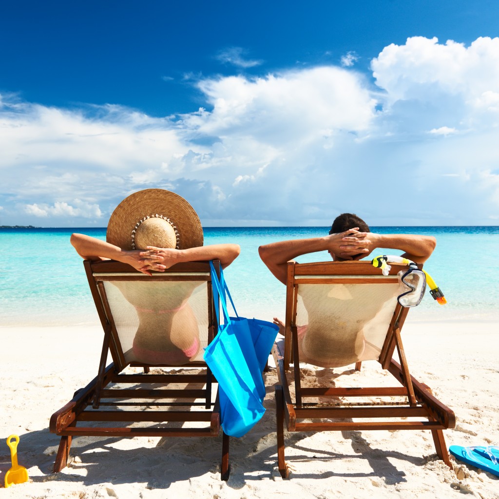 couple relaxing on a beach