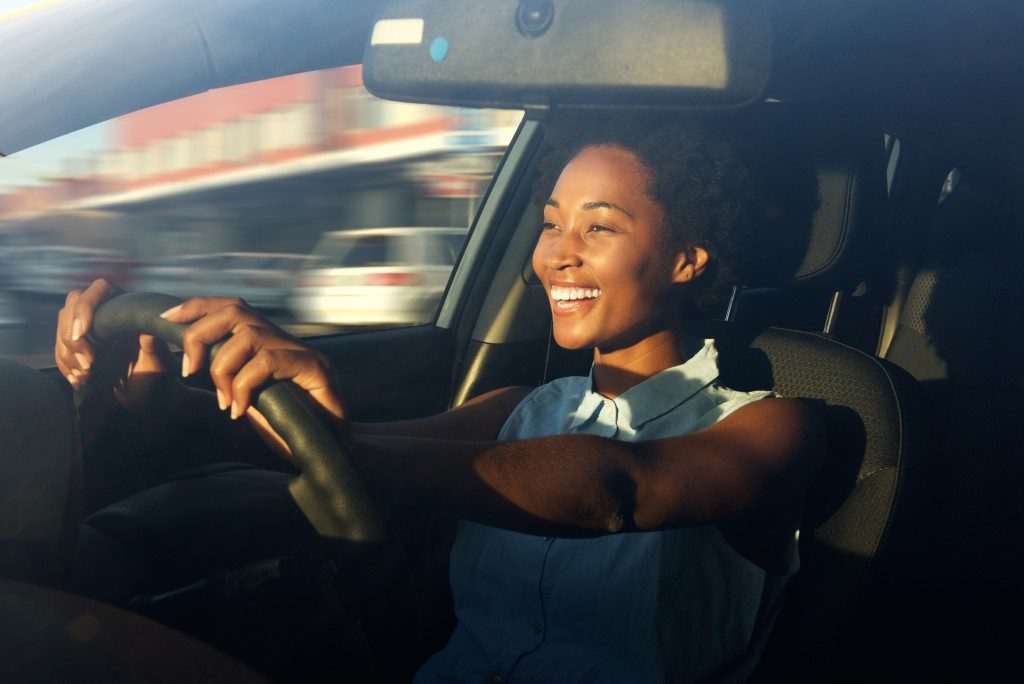 a woman driving a car