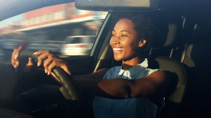 a woman driving a car