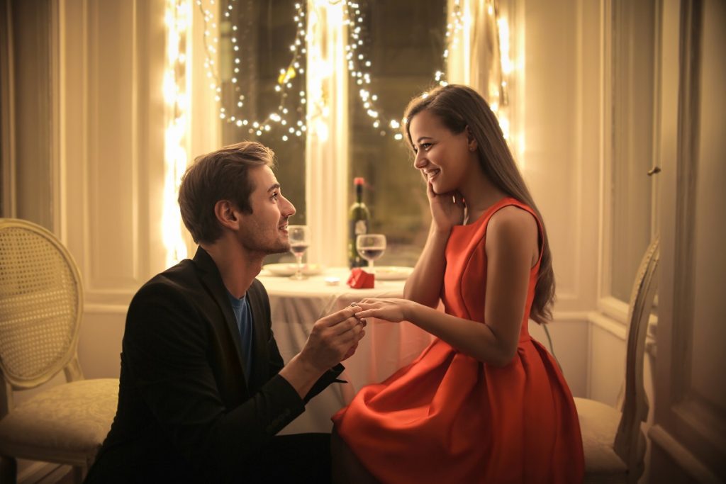 Man getting down on one knee