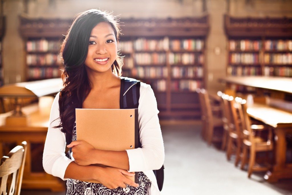 college student in library
