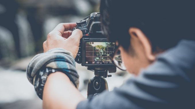 man holding a camera