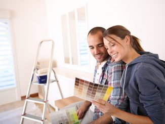 Couple choosing a new wall color