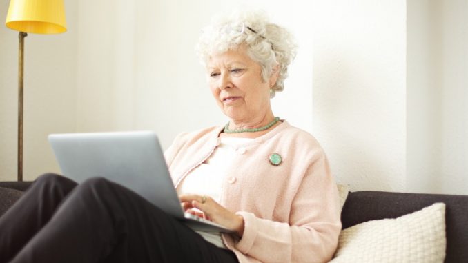 old woman using laptop
