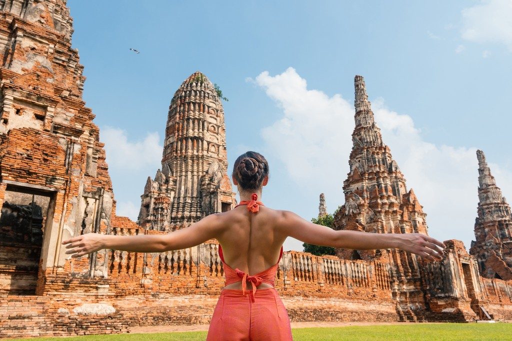 Woman at a temple in Bangkok, Thailand