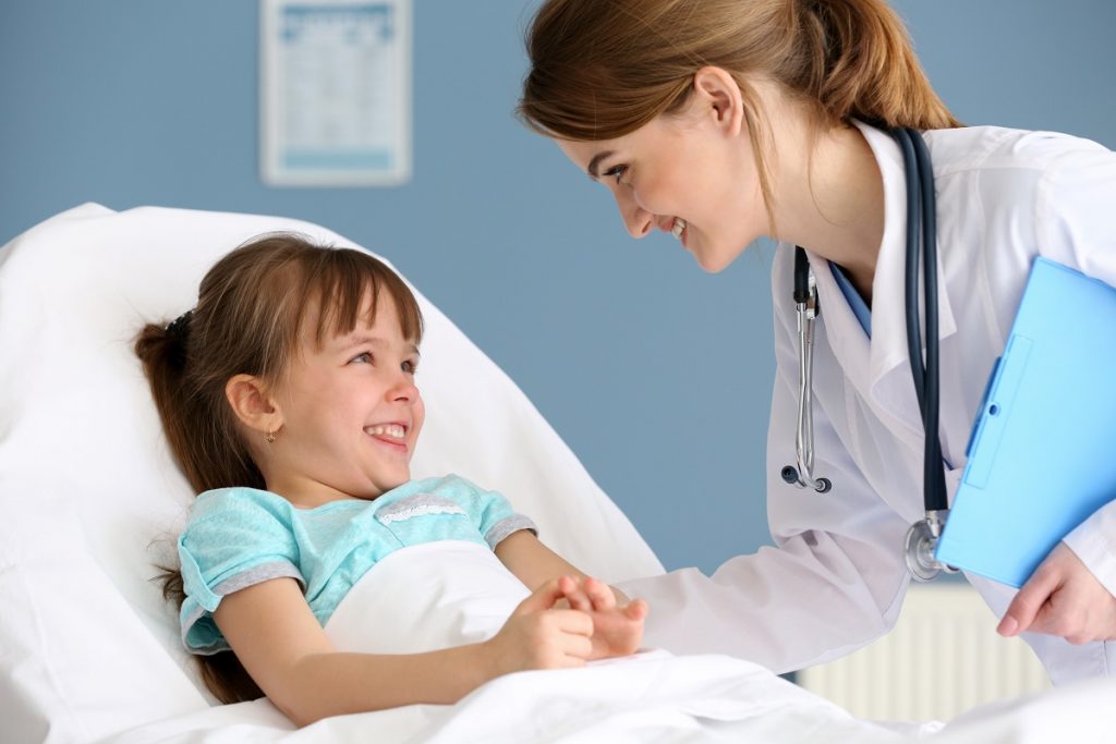 Child smiling at the doctor