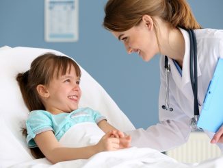 Child smiling at the doctor