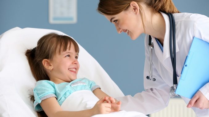 Child smiling at the doctor