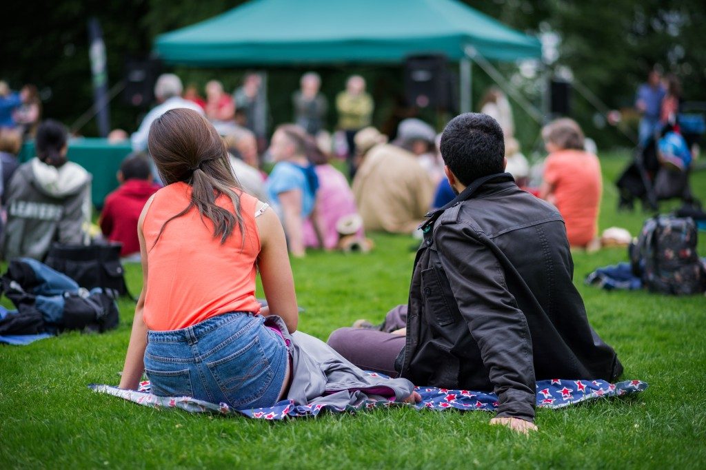Friends sitting on the grass