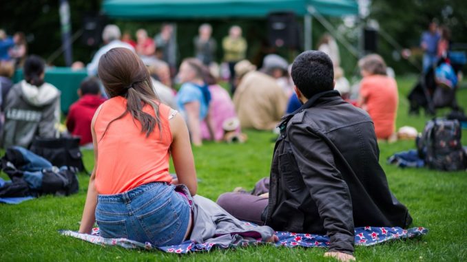 Friends sitting on the grass