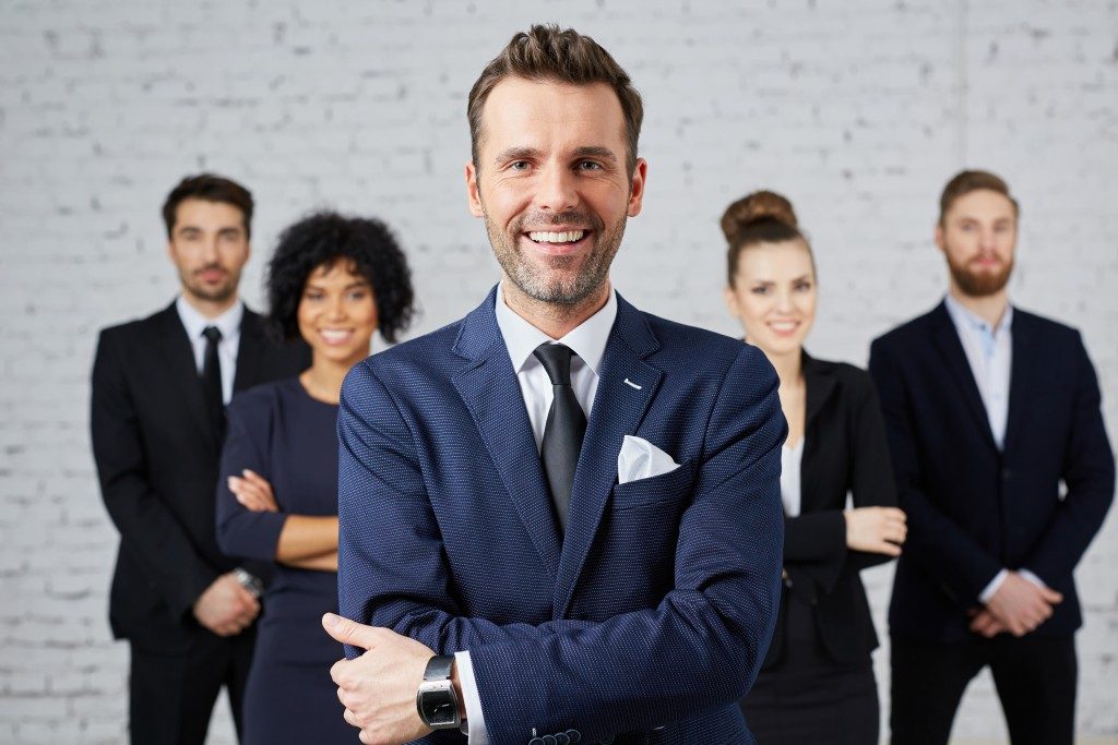 power posing employees dressed in corporate attire