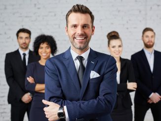power posing employees dressed in corporate attire