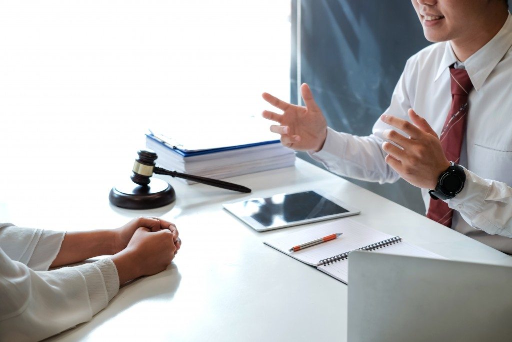 Business lawyer talking to client