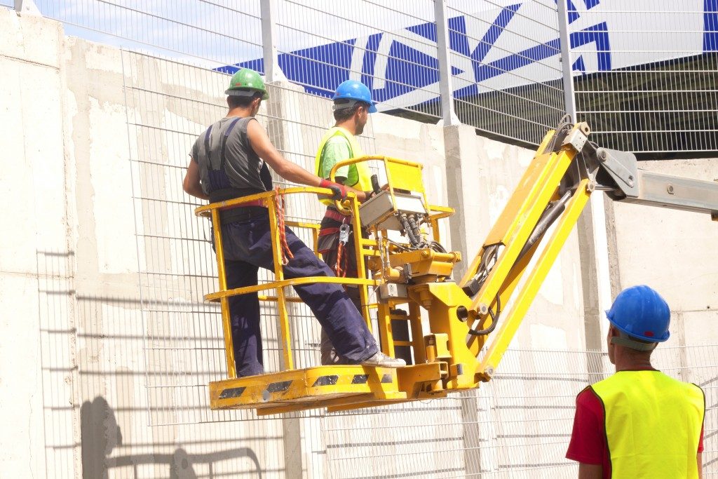 workers on a construction platform