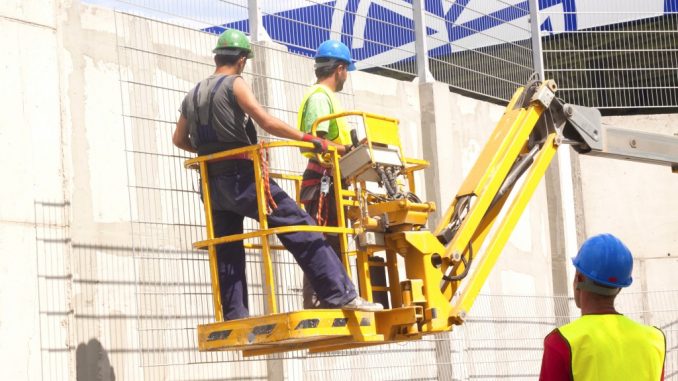 workers on a construction platform