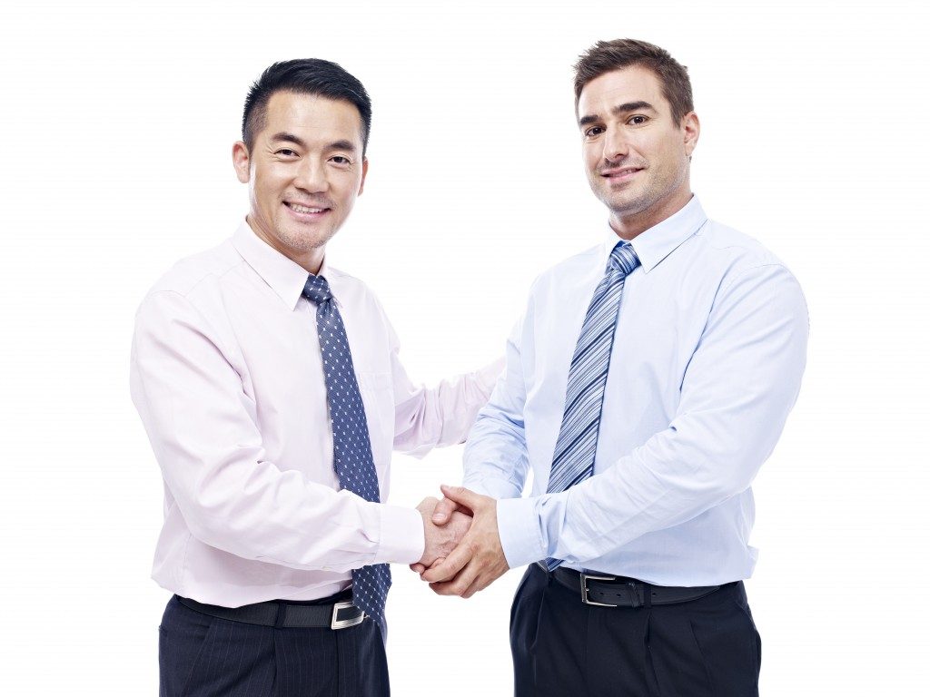 two businessmen shaking hands