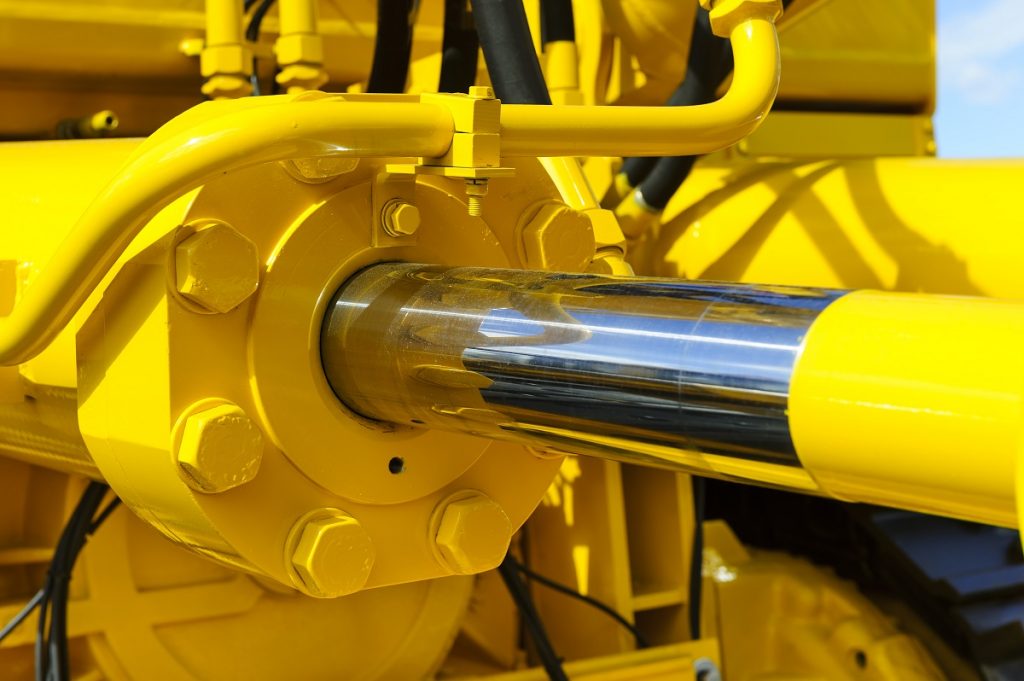 Yellow hydraulic cylinder