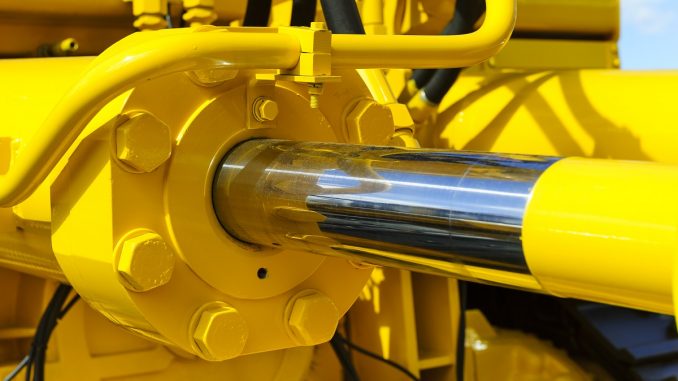 Yellow hydraulic cylinder