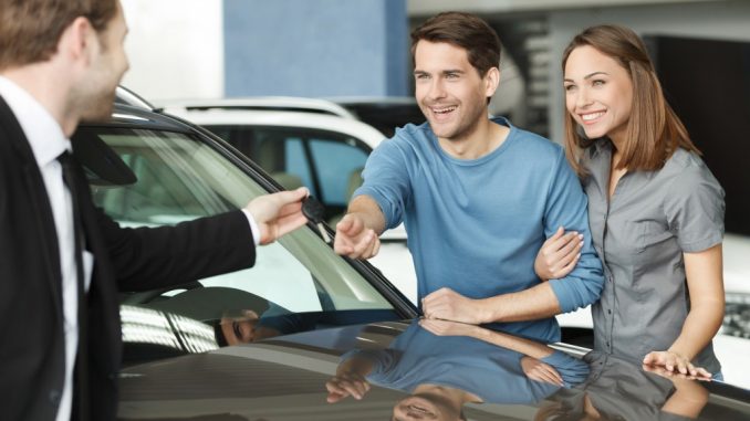 Couple buying a car