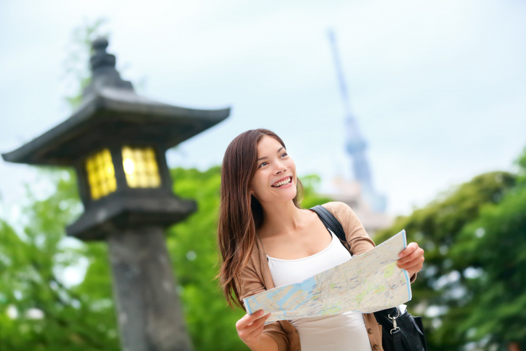 woman looking at a map