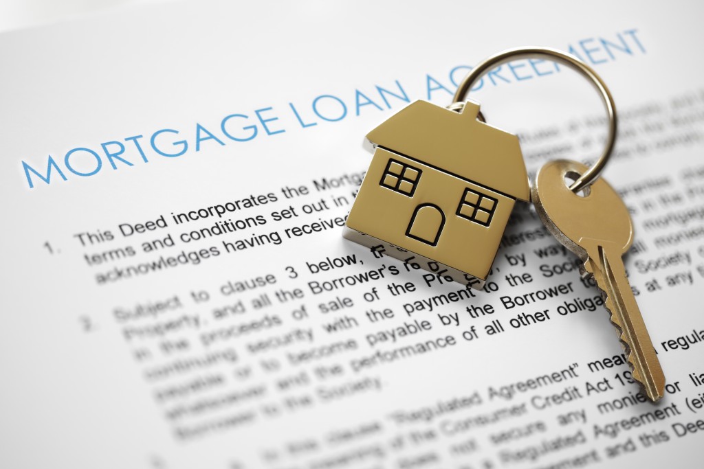 Mortgage loan form with house key