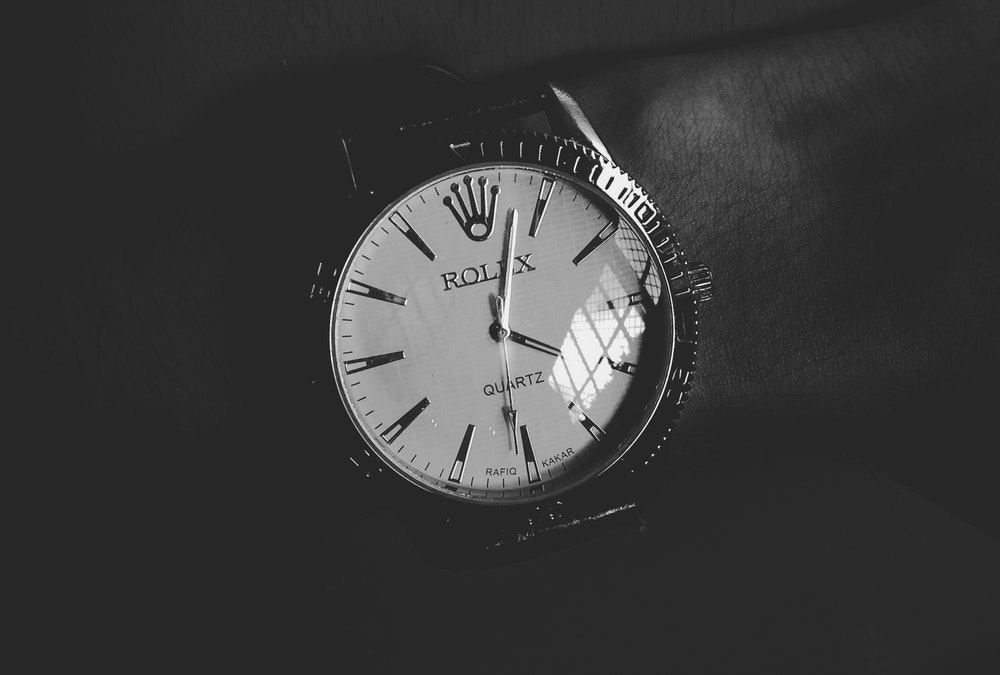 rolex watch in black and white
