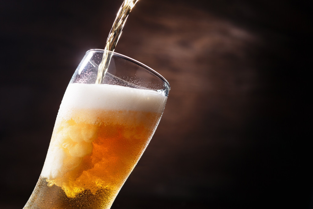 draft beer being poured into a glass