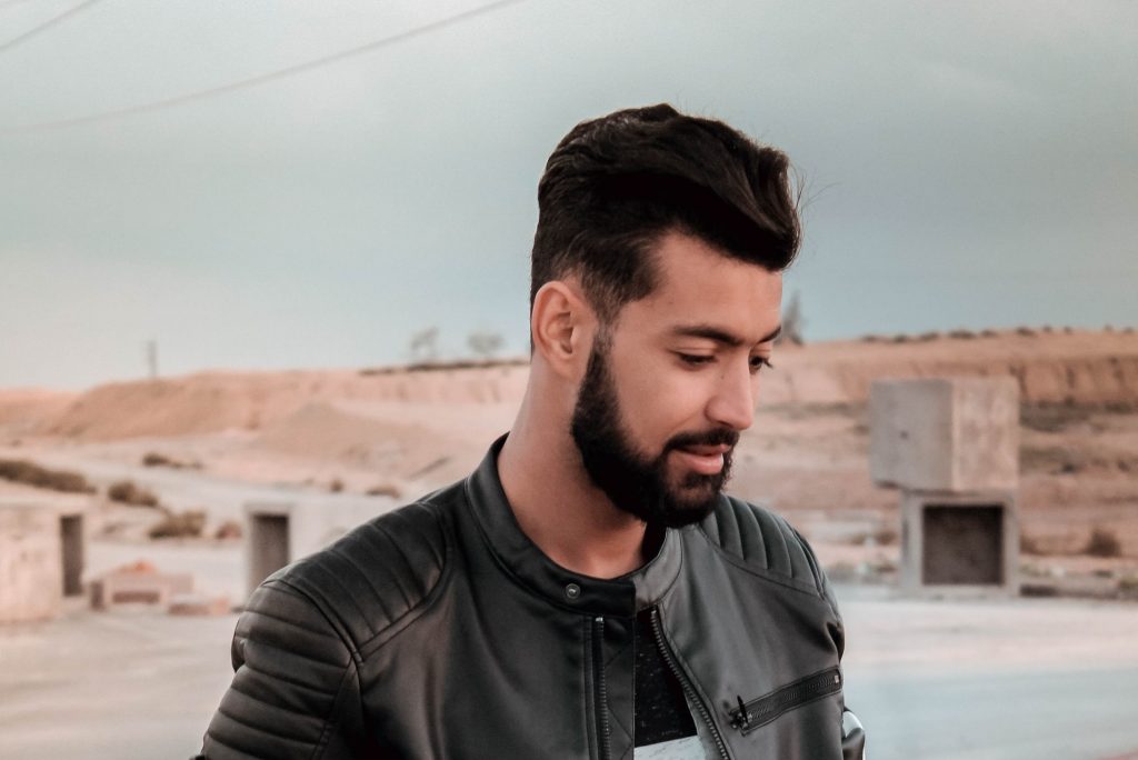 man with beard and black outfit