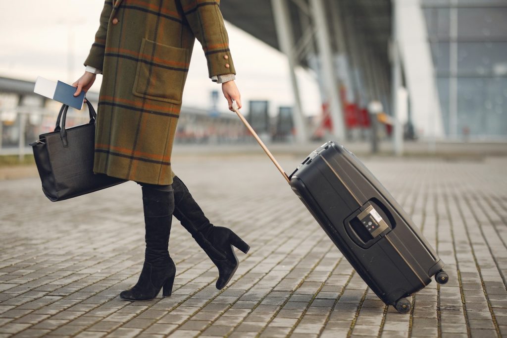 woman carrying luggage