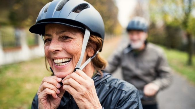 woman wearing a bike helmet